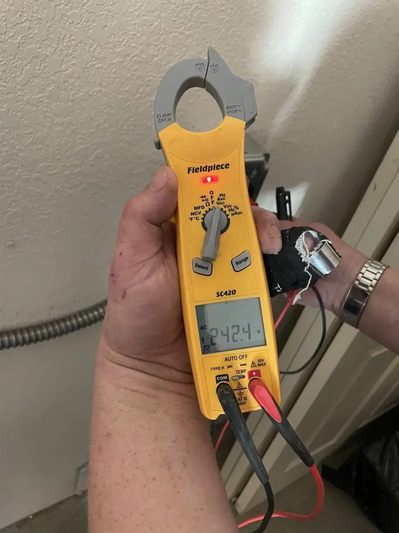 Voltage testing with clamp meter during Generator Installation in Ridgefield Park village